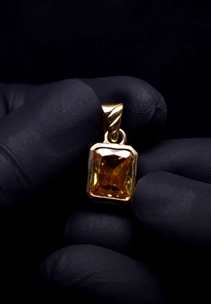 Sapphire gold charm pendant